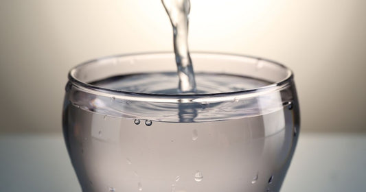 Pouring filtered water into a cup